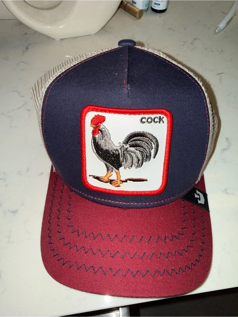 Goorin Bros Navy and Burgundy Rooster Patch Trucker Hat